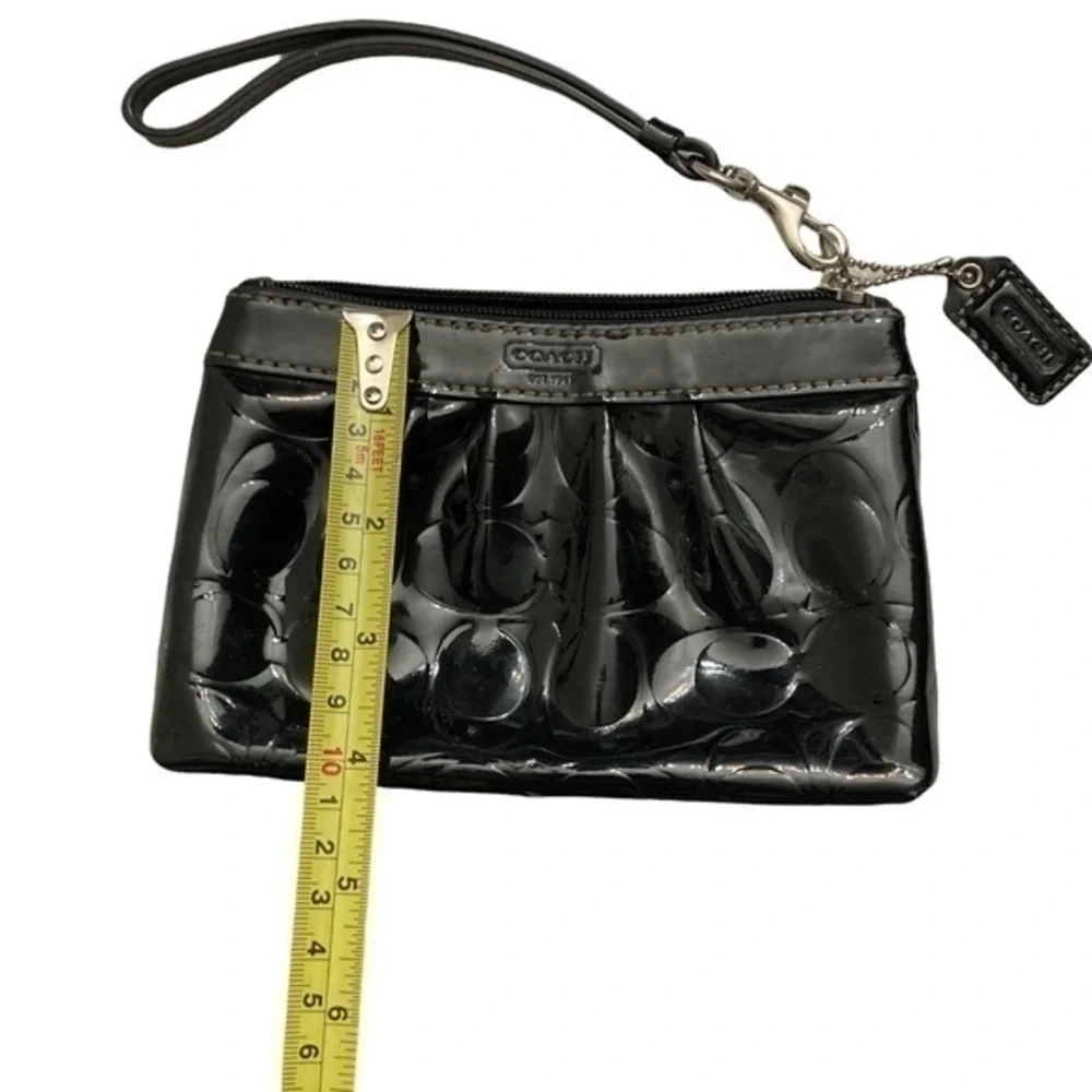 Coach embossed patent leather wristlet bag